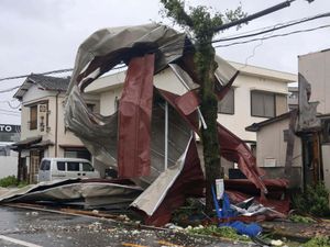 Supporting image for story: At least three dead as Japan is lashed by Typhoon Shanshan