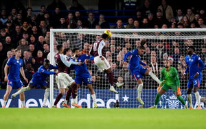 Aston Villa's Ollie Watkins (centre) scores his sides second goal during the Premier League match at Stamford Bridge, London. Picture date: Saturday December 27, 2025.