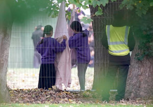 Children play inside the Manston immigration short-term holding facility in Thanet, Kent