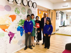 left to right Dempsey (pupil), Mrs Zoe Adams (Headteacher), Cllr Adeela Qayyum, Cllr Shaukat Ali, Daniela (pupil)