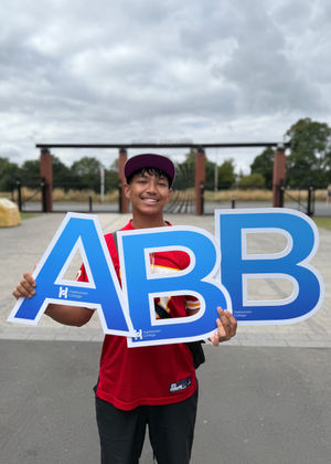 Muhammad Rahman celebrated grades A in Graphic Communication, B in Media and B in Photography