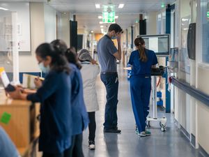 A general view of staff on an NHS hospital ward at Ealing Hospital in London