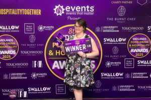 Grace Goodlad collects the Midlands Food, Drink and Hospitality Award for Best Traditional Pub