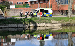 Police near the Kingsland Bridge in Shrewsbury on Monday