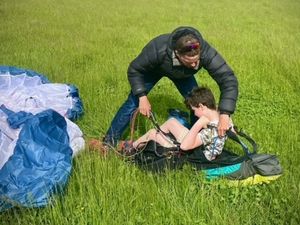 Supporting image for story: WATCH: Newport family welcomes paraglider back to earth after nearly six hours in the sky