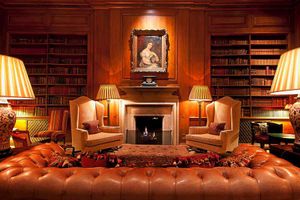 Booking in – relax by the fire in the library