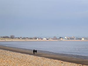 Supporting image for story: Artist faces backlash over plan to build seaside home covered in doodles