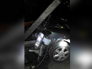 Supporting image for story: PICTURED: Driver escapes injury as car smashes into telegraph pole
