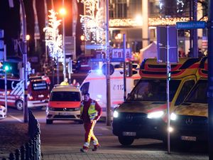 Supporting image for story: At least two people dead after car driven into crowd at German Christmas market