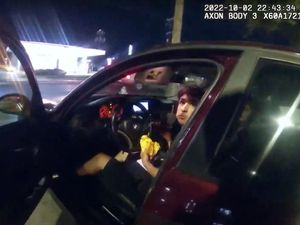 Supporting image for story: Sacked police officer charged after shooting teenager eating a burger in his car