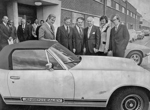 West Bromwich based performance car manufacturer Jensen had recently been bought by American motor tycoon Kjell Qvale (centre) when this picture was taken outside the works in Kelvin Way. He was hosting a delegation of US dealers, along with marketing director Richard Graves, left, and company vice-president George Garbett, right.