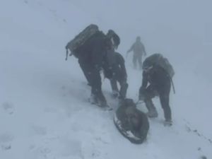 Supporting image for story: Marines on training exercise rescue climber in freezing conditions on Ben Nevis