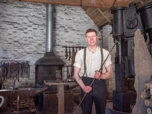 Blacksmith Jack Sampson at work