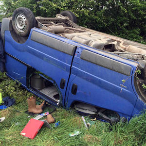The van which ended up on its roof. Pic: @OPUShropshire