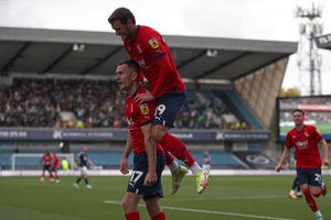 John Swift of West Bromwich Albion celebrates after scoring a goal to make it 0-1 with provider Jed Wallace of West Bromwich Albion during the Sky Bet Championship between Millwall and West Bromwich Albion at The Den on October 22, 2022 in London, United Kingdom. (Photo by Adam Fradgley/West Bromwich Albion FC via Getty Images).
