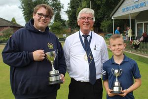 Prize guys – Junior Merit champion Rhys Jordan and (right) consolation winner Rowan Fuller with County Deputy President Andy Jones