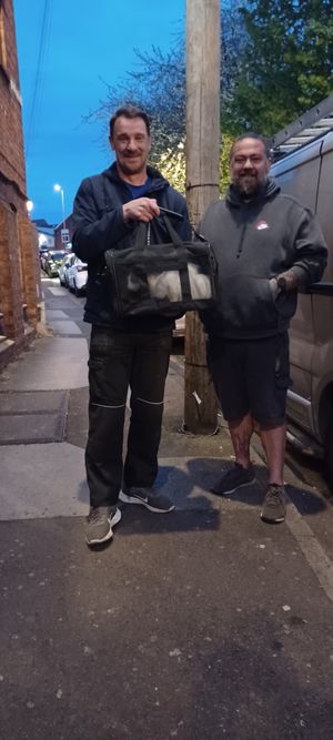 Back on sold ground - the window cleaner and Steve after saving the mother and kittens