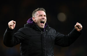 Rob Edwards celebrates with the fans (Photo by Dan Istitene/Getty Images)