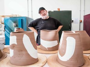 Supporting image for story: Johnny Vegas’ hugs sculpture part of ceramics biennial display