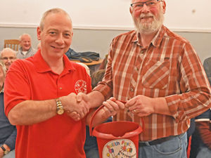 Supporting image for story: Builth Wells Male Voice Chair gives £300 to Builth Festival after carol singing