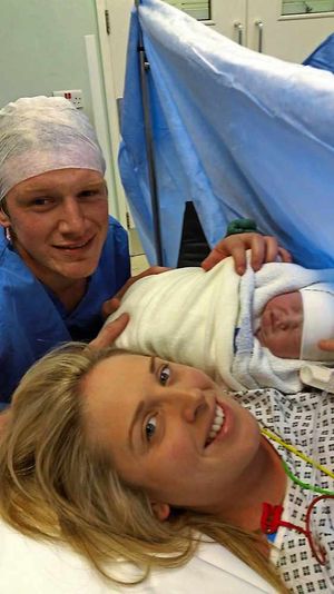 Beth with Cleo and partner Mike Bebb after the delivery