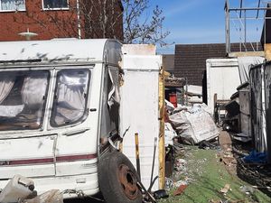 Supporting image for story: Father and son ordered to pay almost £2,000 over 'rat-ridden waste mountain' outside their home