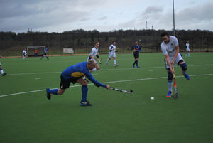 Stourport defence clears the ball.