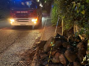 Supporting image for story: Wall in Market Drayton partially collapses after being hit by car