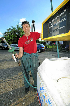 James Cooper at the pumps at Lea Brother garage in Edgmond near Newport