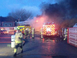 Supporting image for story: Explosions as blaze destroys garage workshop