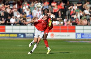 Manny Monthe battles with Matt Smith.