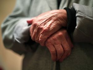 The hands of an elderly woman