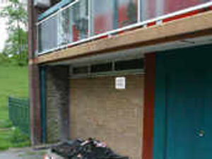 Supporting image for story: Arson-hit flats are emptied