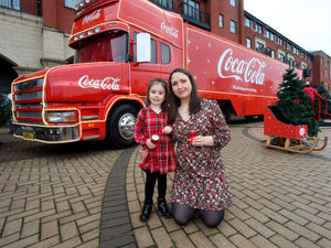 Supporting image for story: Famous Coca-Cola truck visits Wolverhampton in delayed Christmas treat