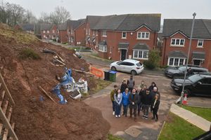 Residents at Haden Cross Drive, Cradley Heath, where a landslide has caused problems for residents. Photo: Steve Leath