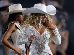 Beyonce performing during halftime of an NFL football game between the Houston Texans and the Baltimore Ravens