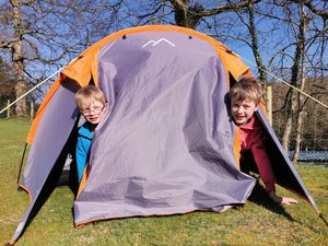 Supporting image for story: Twins brave the outdoors and camp for children's hospices