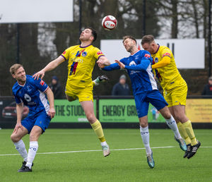 Mitch Clarke beaten to the header.