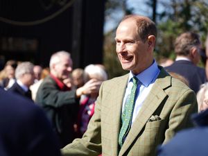 Supporting image for story: Duke of Edinburgh goes behind the scenes at zoo to prepare gorilla food