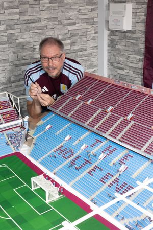 Aston Villa fan Alan Crampton with his 10ft 8ins x 7ft 7ins detailed Villa Park replica.