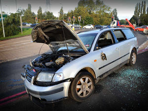 Supporting image for story: Smashed-up car finally moved... a MONTH after the crash