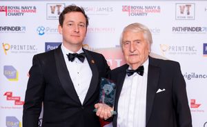 Peter Webber (right) receives the Contribution to Lifetime Entrepreneurship Award from Pip Lee-Woolf of Vigilance 