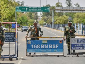 Indian Border Security Force soldiers stand guard at the barricade on the road leading to the Attari-Wagah border on India’s side, near Amritsar