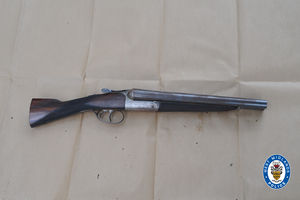 A double barreled sawn-off shotgun was used in the tragic killing