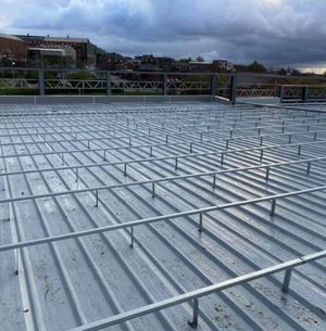 Roof liner sheets have been fitted on parts of the structure