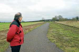 Councillor Eric Carter looks back along the old railway track on the outskirts of Newport