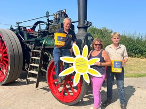 Edward Goddard (left), chairman of the County of Salop Steam Engine Society, his nephew Will (right) and Angela Hill, fundraiser for Lingen Davies Cancer Support. The Onslow Steam Rally, which takes places on the outskirts of Shrewsbury, will raise money for the cancer charity this year