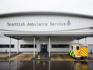 Exterior view of a Scottish Ambulance Service base, with one ambulance parked outside