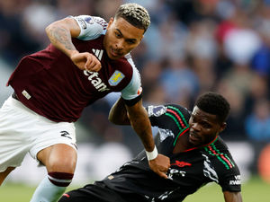 Supporting image for story: Aston Villa skipper John McGinn backs 'scary' Morgan Rogers for England honours