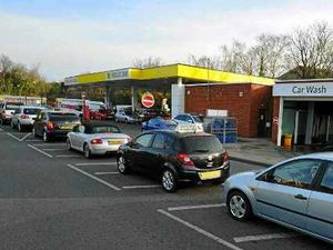 Supporting image for story: Queues at Midlands pumps as drivers panic buy fuel